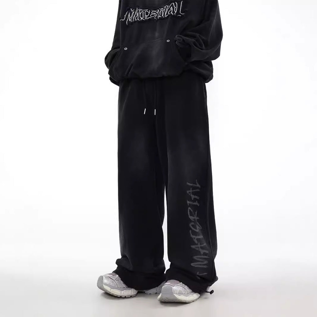 ACID WASHED INITIAL PANTS