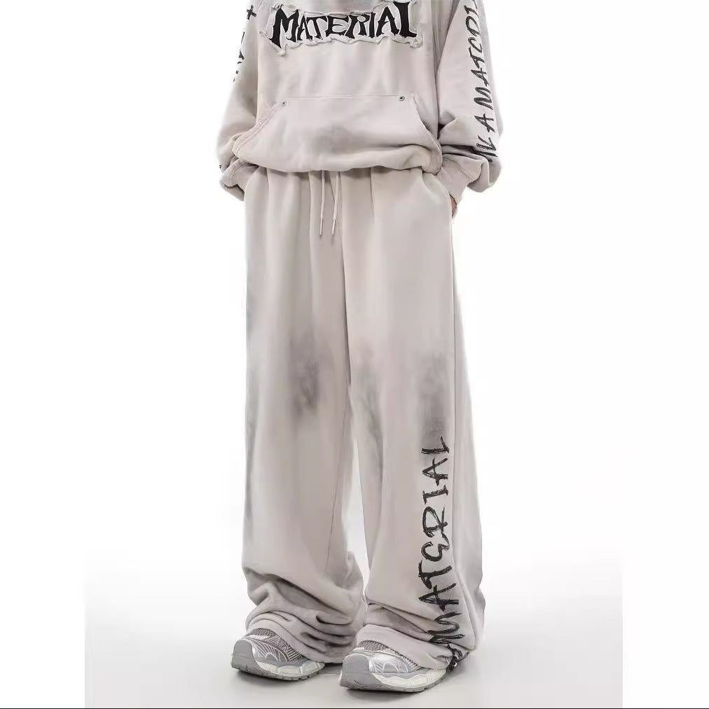 ACID WASHED INITIAL PANTS